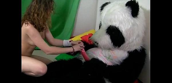  Titted brunette to have sex with huge toy panda